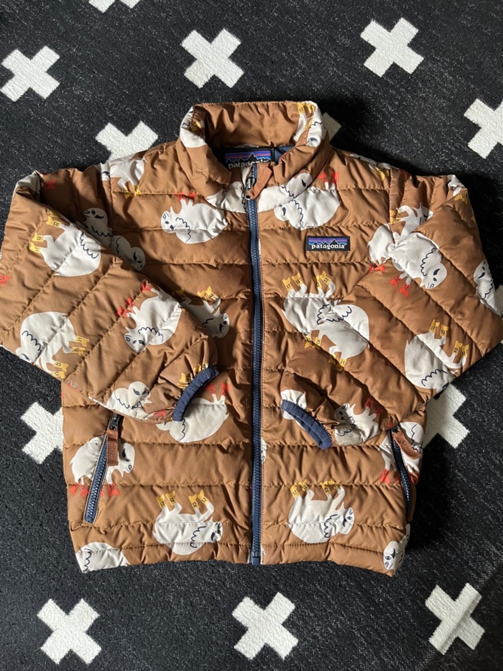 Patagonia Brown Puffer Jacket with White Animal Print